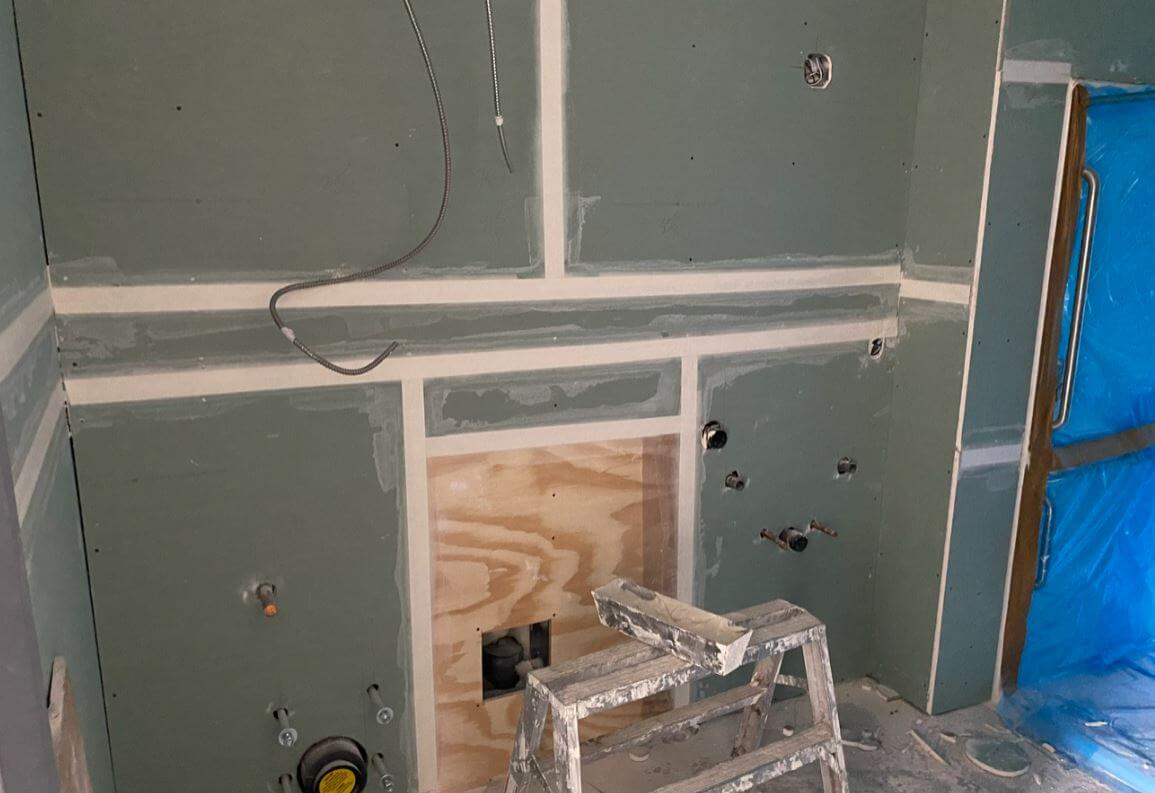 Walls in washroom with drywall tape