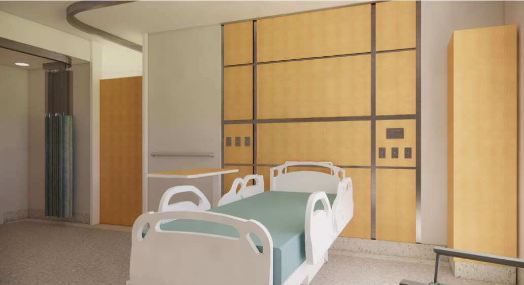 Patient room with white bed, blue bedding and wooden millwork on walls.